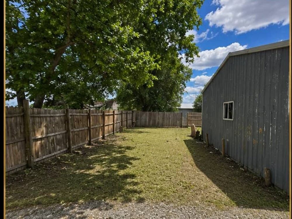 Cleared and mowed fenced yard ready to enjoy after cleanup